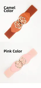 Details von elastischen Gürteln in Camel und Rosa mit goldenen Herzschnallen für Kleider