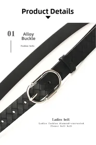 Détail d'une ceinture tressée noire pour femme avec boucle en alliage argenté poli