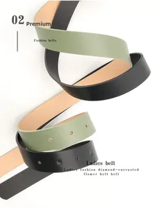 Detail of high-quality PU leather belts with rhinestone alloy buckle and contrast lining
