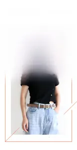 Classic brown leather belt with gold buckle worn on blue jeans and black t-shirt