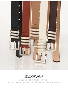 Close-up of slim fashion belts in five colors with silver square buckles and triple loop loops