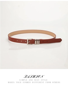Detail of slim dark brown leather belt with silver square buckle and triple metal loops
