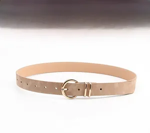 Detail of khaki PU leather belt showing matte texture and gold round pin buckle