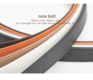 Macro shot showing slim belts with precise stitching in multiple colors like brown and black