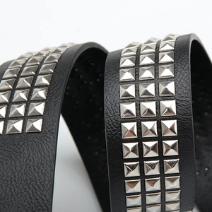 Punk style black leather belt with three rows of silver square pyramid metal studs