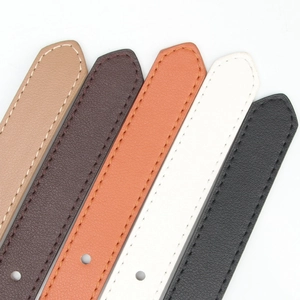 Minimalist leather belts for women with oval buckle and textured litchi grain finish