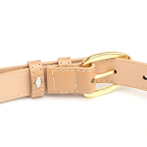 Minimalist light brown leather belt for women with gold oval buckle and white stitching