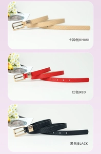 Three slim leather belts in khaki, red, and black with textured golden pin buckles