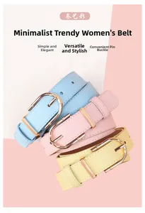 Three leather belts with bamboo buckles in blue, pink and yellow on a clean background