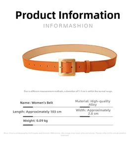 Detail view of a bright orange leather belt for women with a gold square buckle