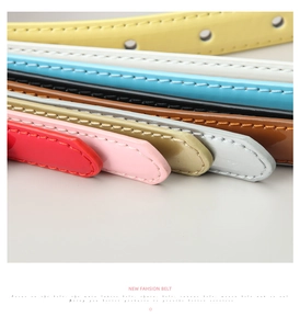 Vue détaillée de fines ceintures en similicuir multicolores avec surpiqûres précises