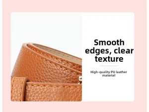Detailed macro view of litchi texture brown PU leather belt with smooth edge and stitching