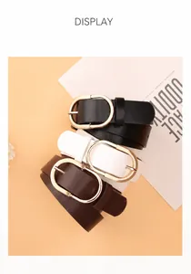 Detailed view of women's minimalist PU leather belts in black, white, and brown with gold buckles
