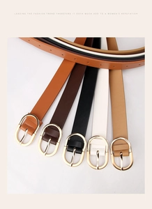 Collection of thin leather belts for women in multiple colors with gold D-ring buckles