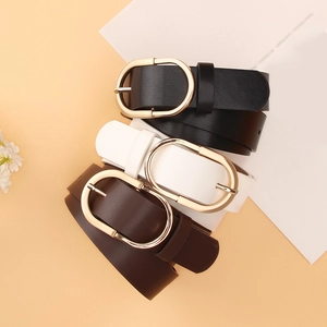 Three minimalist women's leather belts with golden oval buckles in black, white, and brown
