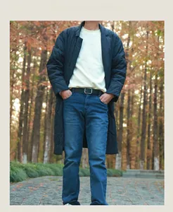 Classic black leather belt with silver pin buckle styled on casual denim jeans