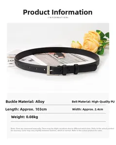 Detail view of black PU leather belt with alloy pin buckle on a magazine and yellow rose