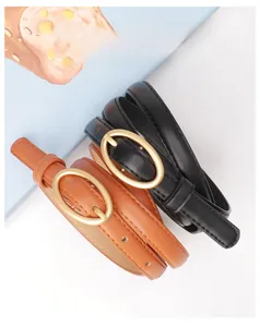 Set of two slim women's belts in black and brown with elegant oval matte gold buckles