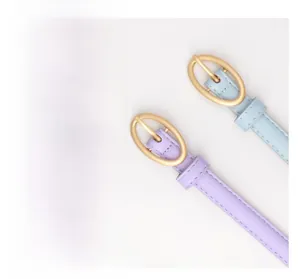 Detail of slim lavender and light blue leather belts with golden oval buckles and stitching