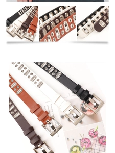 Dettaglio di cinture punk multicolore con occhielli in metallo e fibbie ad ardiglione