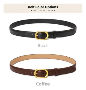 Close-up of black and coffee leather belts with elegant oval gold metal buckles