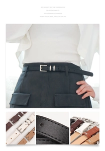 Detail of slim faux leather belts with metal square buckles in multiple colors and textures