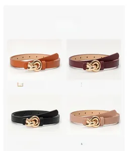 Detail of four stylish waist belts in Camel, Coffee, Black, and Khaki with gold knot buckles