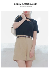 Deep brown slim leather belt styled with khaki high-waisted shorts and a chain bag