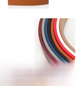 Close-up of thin leather belts showing smooth edges and high-quality stitching detail