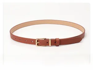Detailed close-up of brown leather belt with gold metal buckle and neat stitching