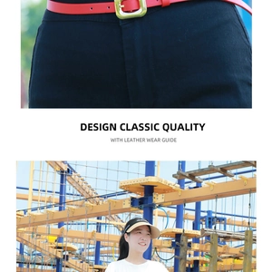 Detail of red leather belt with gold buckle and beige sun visor hat for outdoor sport