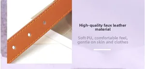 Détail de la ceinture en cuir PU marron avec surpiqûres orange et perforations précises