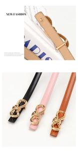 Detail of elegant slim leather belts for women with golden twist buckle in multiple colors