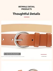 Close-up of a brown leather belt featuring a high-quality silver alloy D-ring buckle