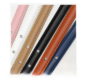 Detail showing multi-color leather belts with fine stitching and adjustable round holes