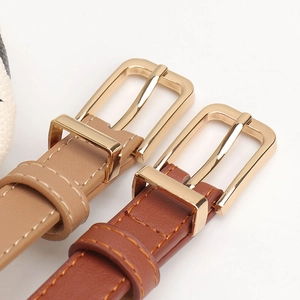 Minimalist women leather belts in khaki and brown with polished gold pin buckles
