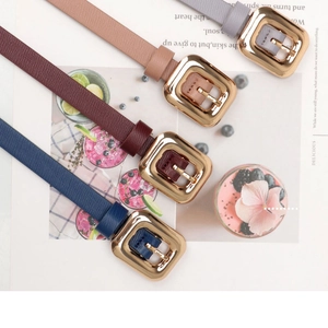 Detail of elegant slim waist belts in four colors with glossy gold pin buckles