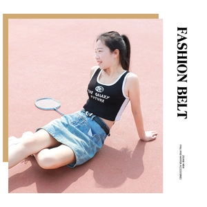 Classic black PU leather belt with silver square buckle styled with casual denim skirt