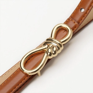 Brown leather belt with unique golden knot buckle design for women's stylish dress decor