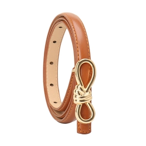 Elegant brown leather skinny belt for women with a gold knot buckle on white background