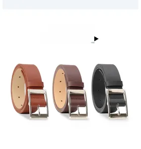 Detailed view of camel, coffee, and black PU leather belts with silver metal pin buckles