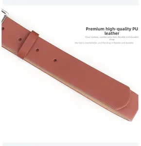 Close-up of brown PU leather belt showing clear texture and neat round punch holes