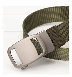 Close-up of olive green nylon tactical belt with zinc alloy automatic buckle detail