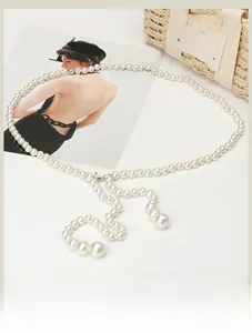 Elegant multi-layered pearl waist chain with large pearl drops and metal lobster clasp