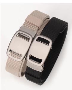 Close-up of tactical nylon belts with matte alloy buckles in black and khaki colors