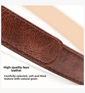 Detail of dark brown leather belt showing smooth texture and neat edge stitching