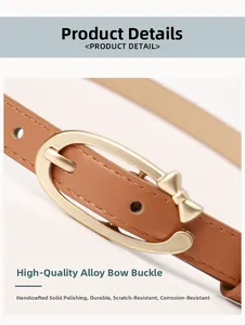 Détail d'une boucle nœud dorée sur ceinture en cuir PU marron avec finition polie