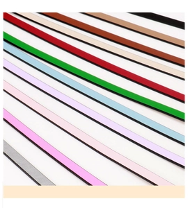 Detailed view of 1.0cm slim PU leather belts in various colors for dresses and suits