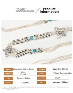 Détail d'une ceinture bohème en corde cirée avec pendentifs papillon en métal