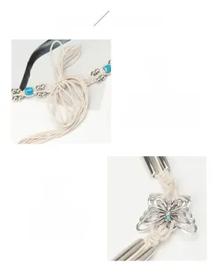 Détail d'une ceinture bohème en corde cirée avec papillons en métal argenté et perles turquoise